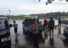Personel Polsek Mande Bersama Warga Laksanakan Bersih-Bersih Dermaga Waduk Jangari